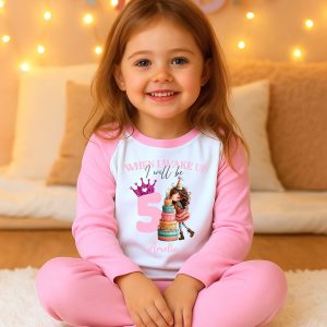 Personalised grey birthday pyjamas for girls with "When I Wake Up I’ll Be 3" design, birthday cake, and girl's name printed on the top.