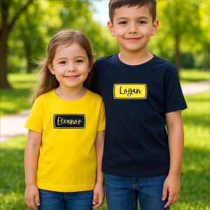 Brother and sister wearing personalised kids name t-shirts in navy and yellow